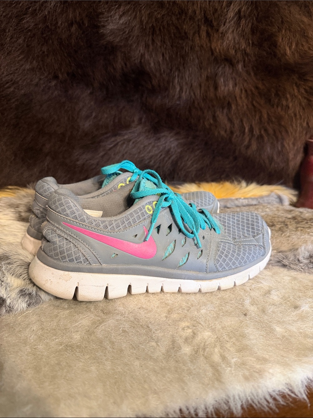 Nike Gray Athletic Shoes with Pink Swoosh and Teal Laces